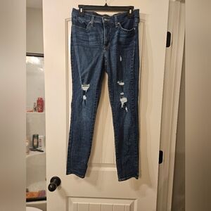 Women's Distressed Blue Jeans